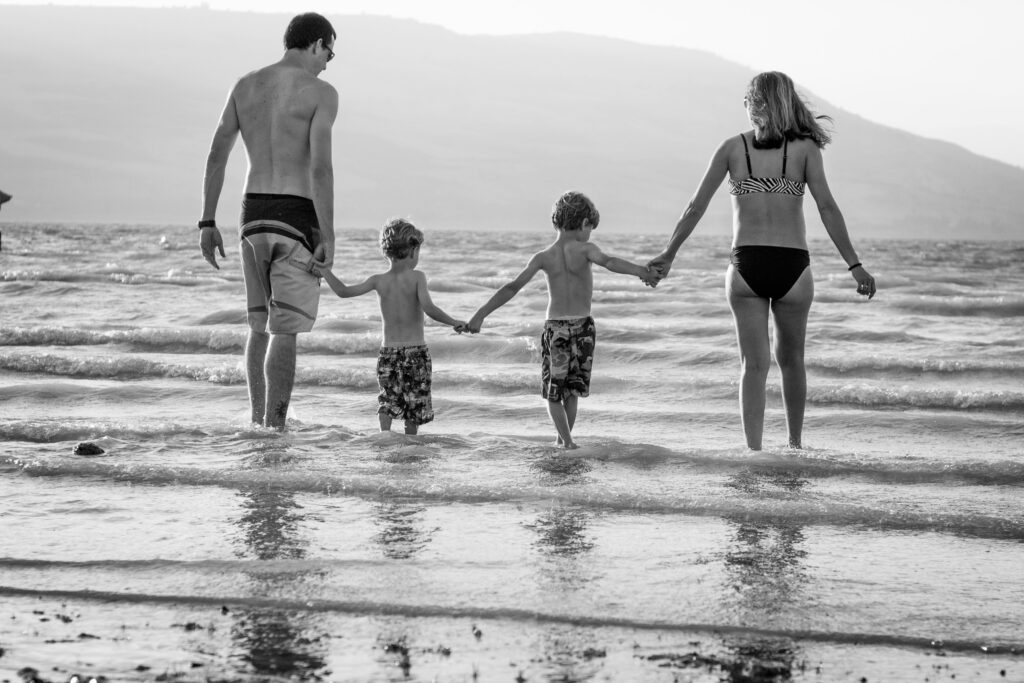 Family at the beech after achieving sustainable weight loss