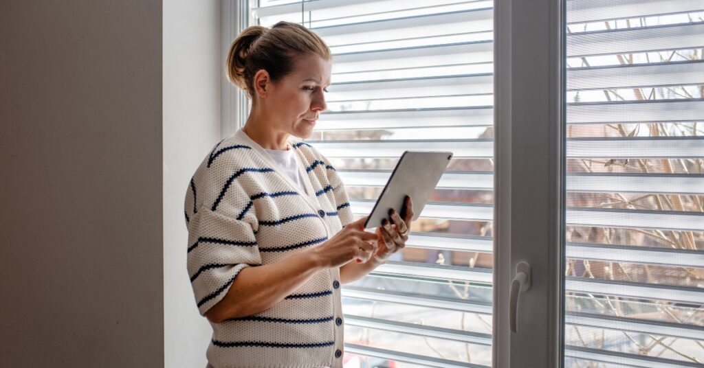 Woman on a telehealth call discussing progesterone therapy for perimenopause