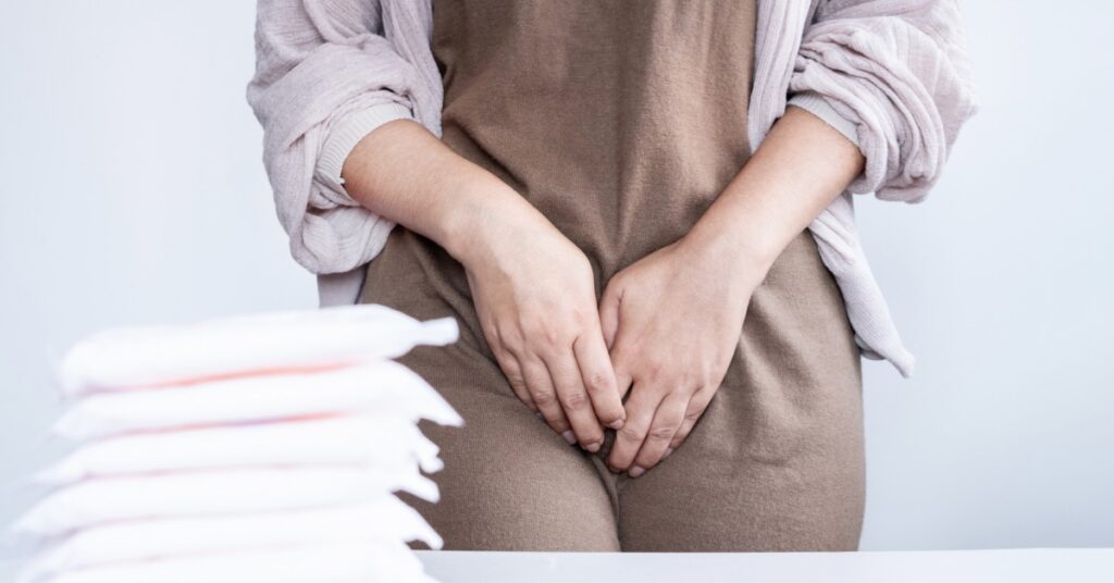Woman experiencing vaginal discomfort associated with menopause symptoms