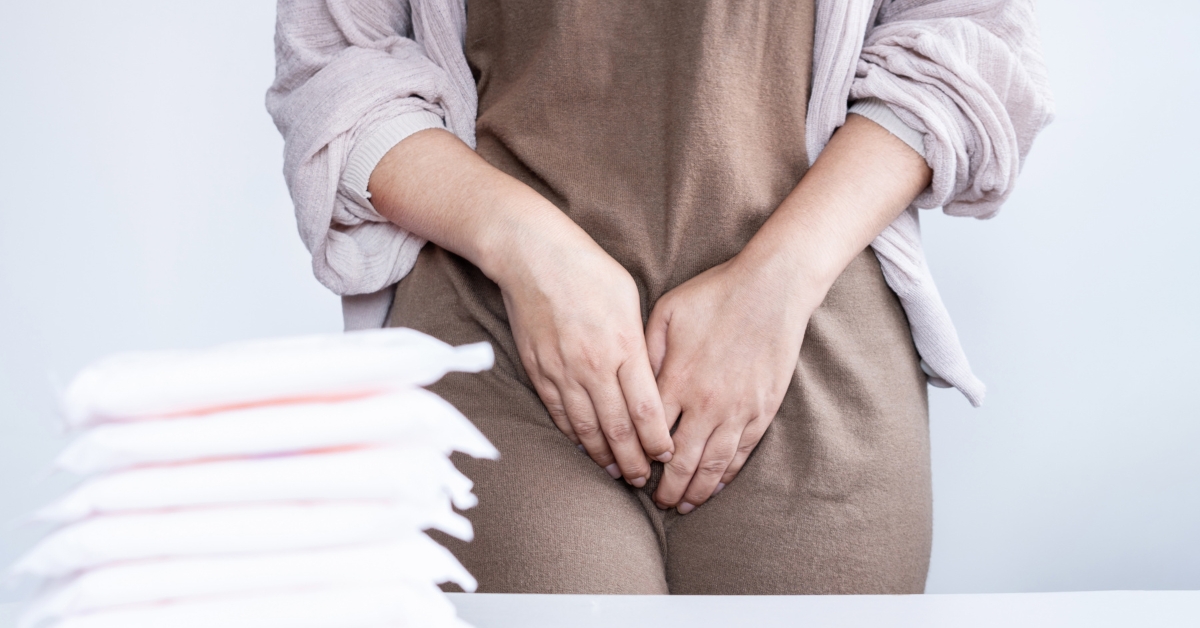 Woman experiencing vaginal discomfort associated with menopause symptoms