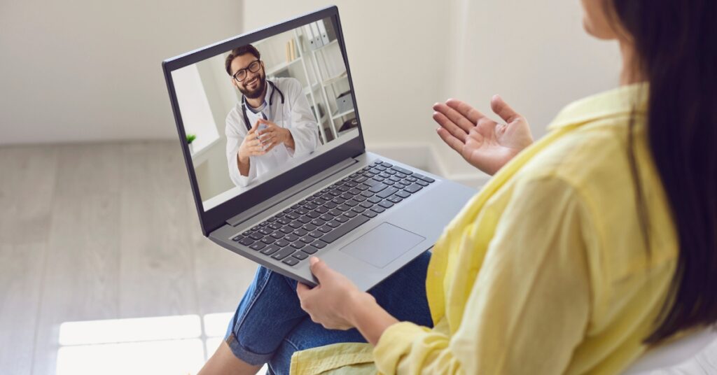 Patient speaking with a healthcare provider during an online peptide therapy consultation.