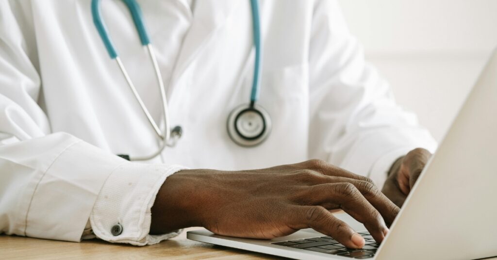 Board-certified physician providing a virtual hormone therapy consultation.