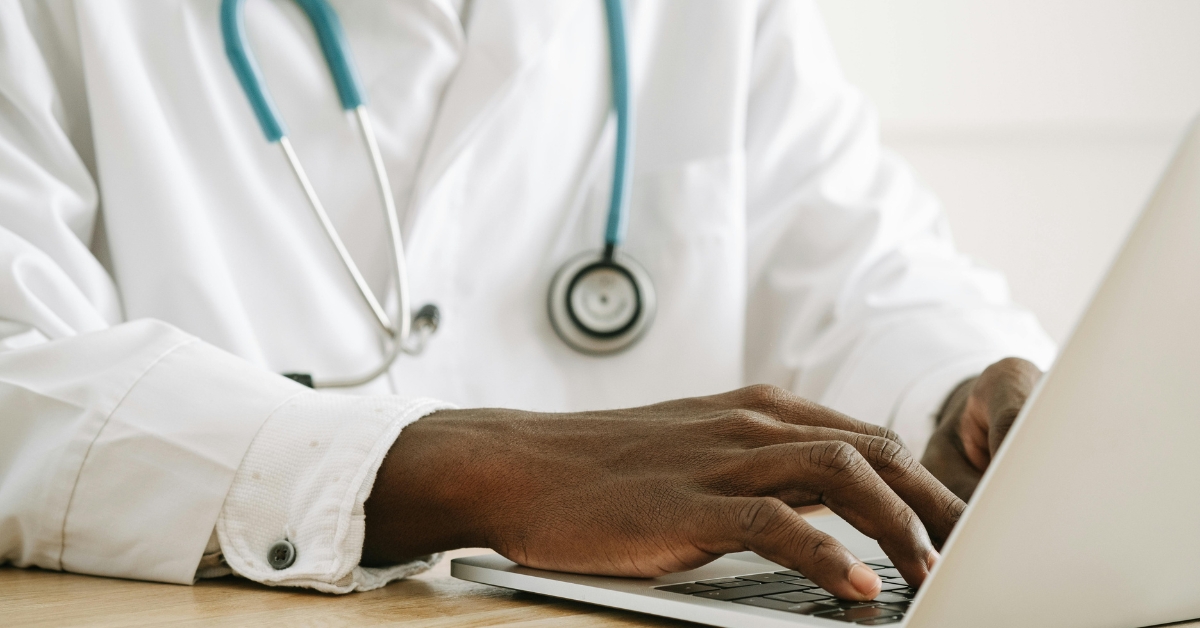 Board-certified physician providing a virtual hormone therapy consultation.