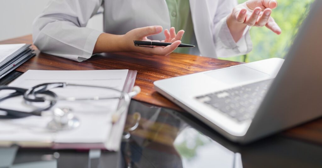 Patient speaking with a healthcare provider during an online consultation